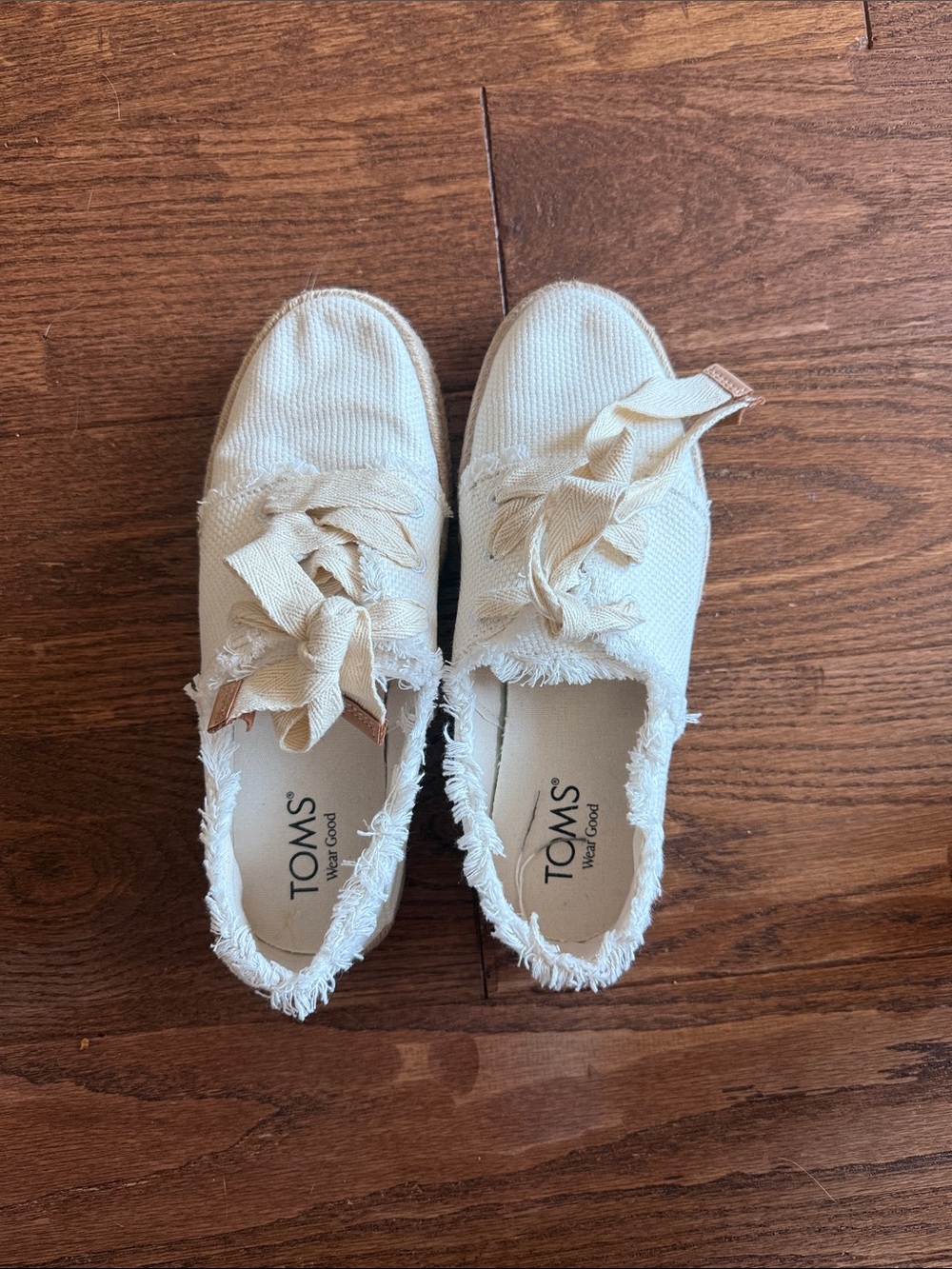 TOMS Cream Canvas Frayed Slip-On Sneakers